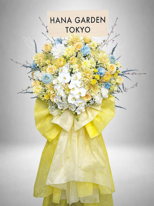 Re:Bloom イエローパステル胡蝶蘭スタンド イエローと淡いブルーの花々と胡蝶蘭を使用した上品なフラワースタンド